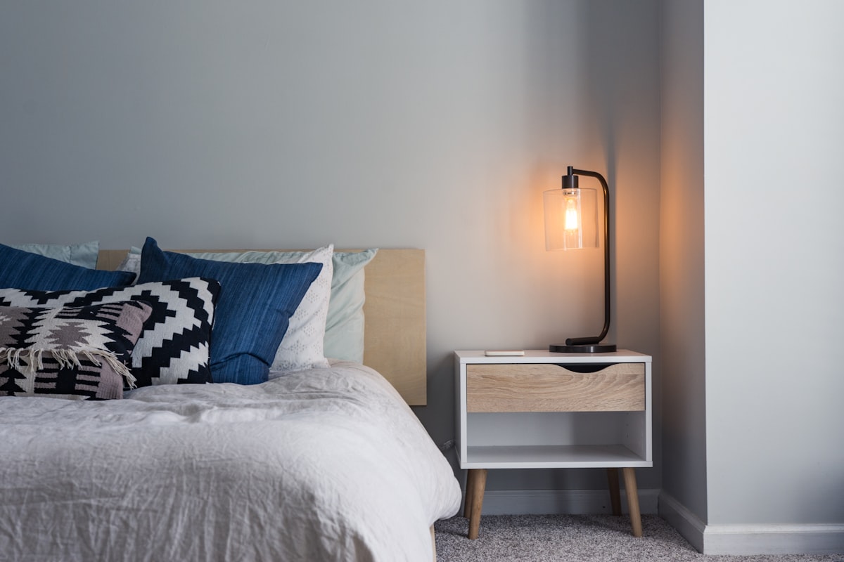 A peaceful bedroom in soft darkness